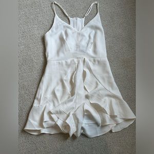 White ruffled romper size small